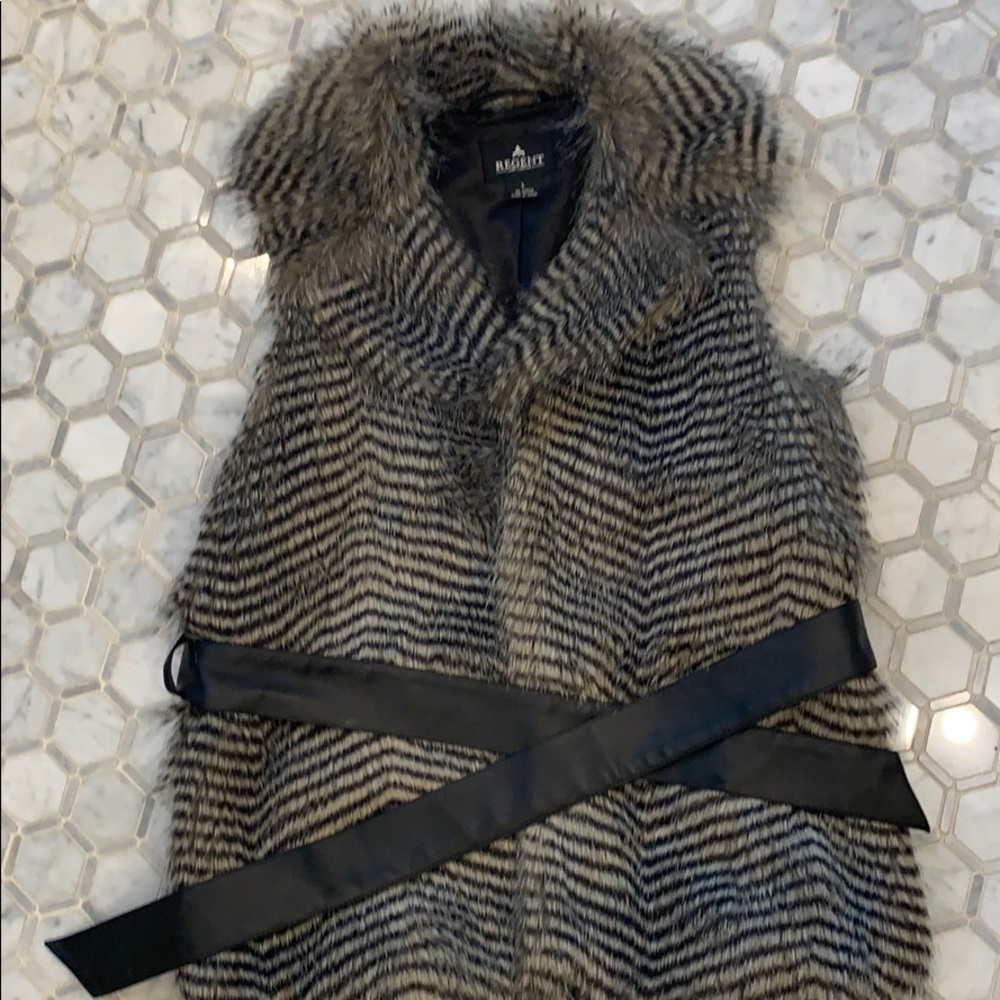 Faux fur vest with leather belt